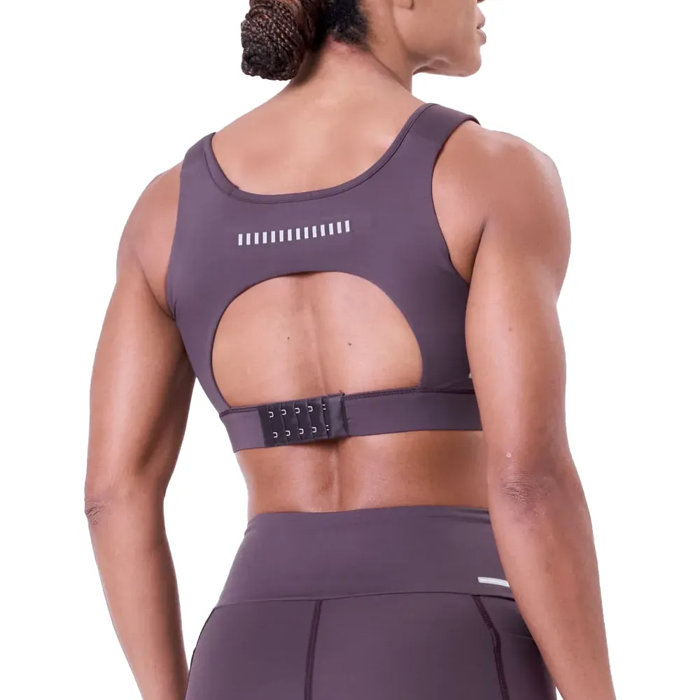Vista traseira do top esportivo roxo Authen mostrando design e ajuste confortável